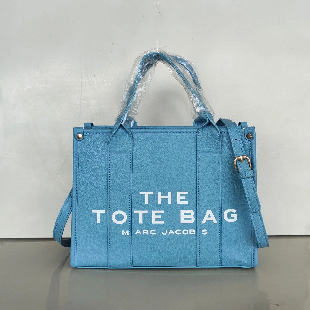 Women's Crossbody Tote Bag – Embossed Details, Compact Design — Three line character - Lake Blue