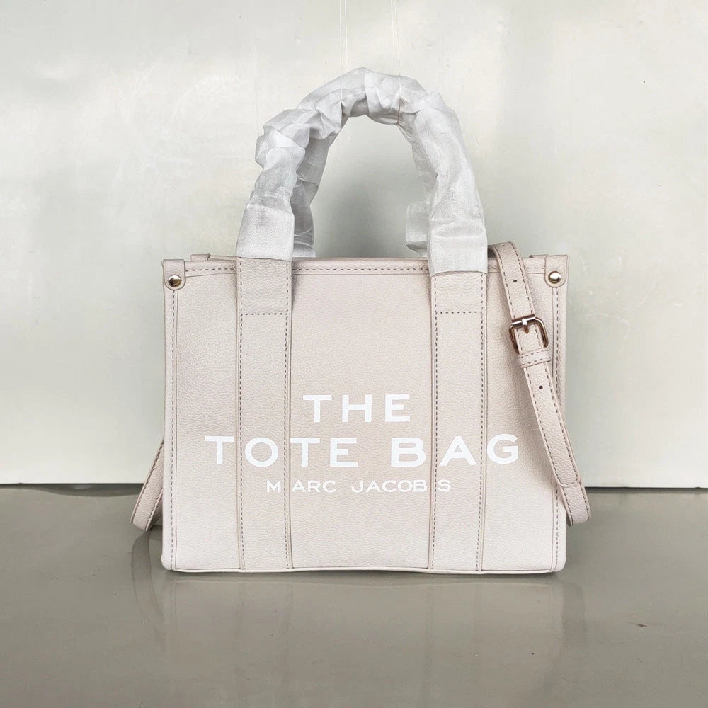 Women's Crossbody Tote Bag – Embossed Details, Compact Design — Three line characters - light gray with white printing