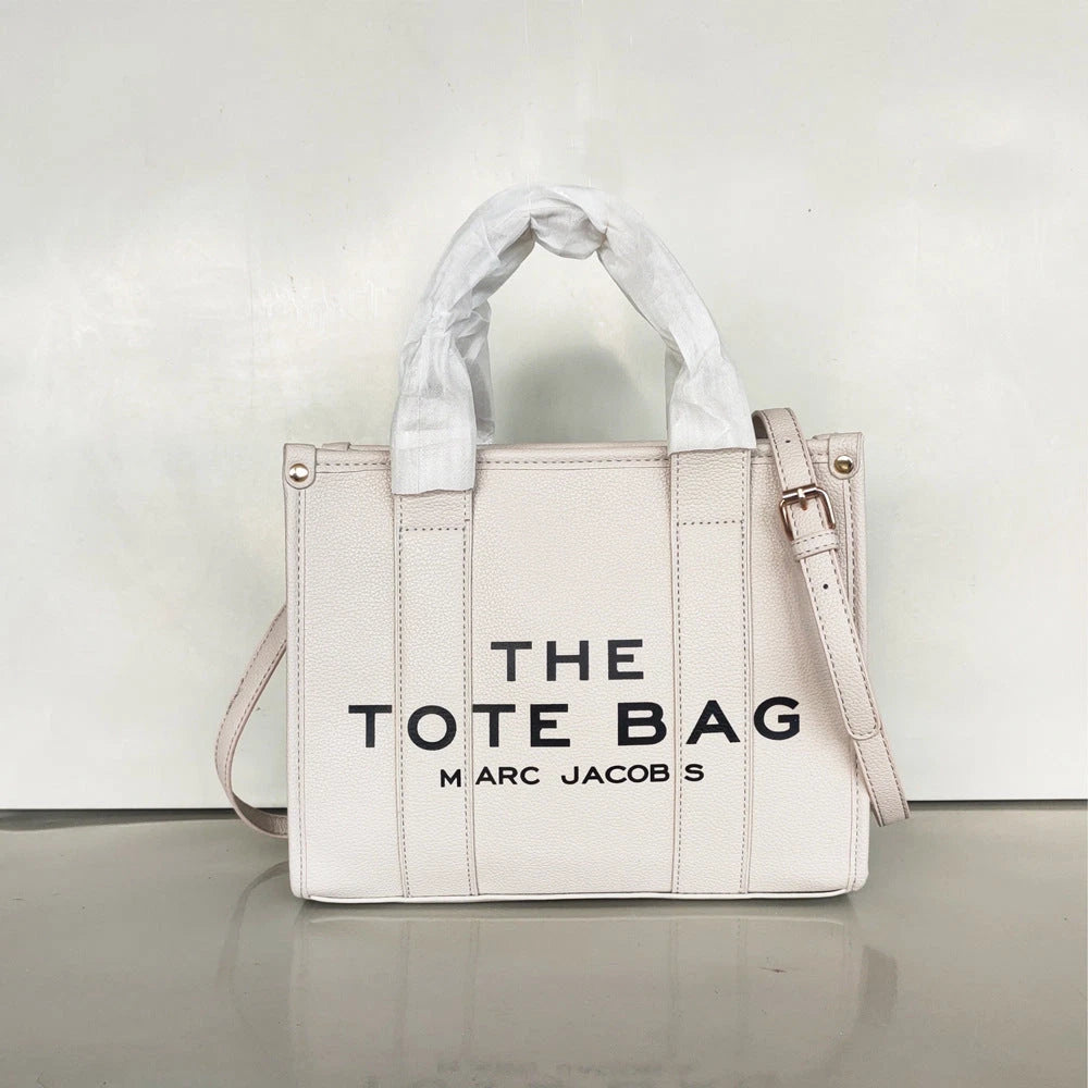 Women's Crossbody Tote Bag – Embossed Details, Compact Design — Three line characters - light gray with black printing