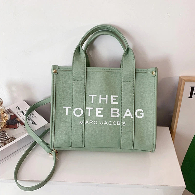 Women's Crossbody Tote Bag – Embossed Details, Compact Design — Three line characters - light green