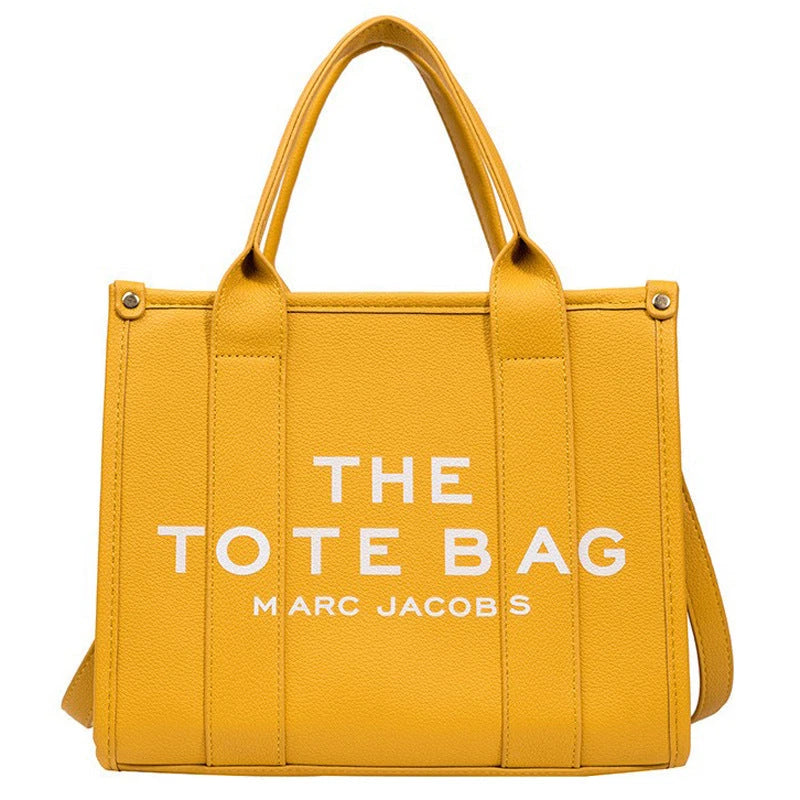 Women's Crossbody Tote Bag – Embossed Details, Compact Design — Three line characters - yellow